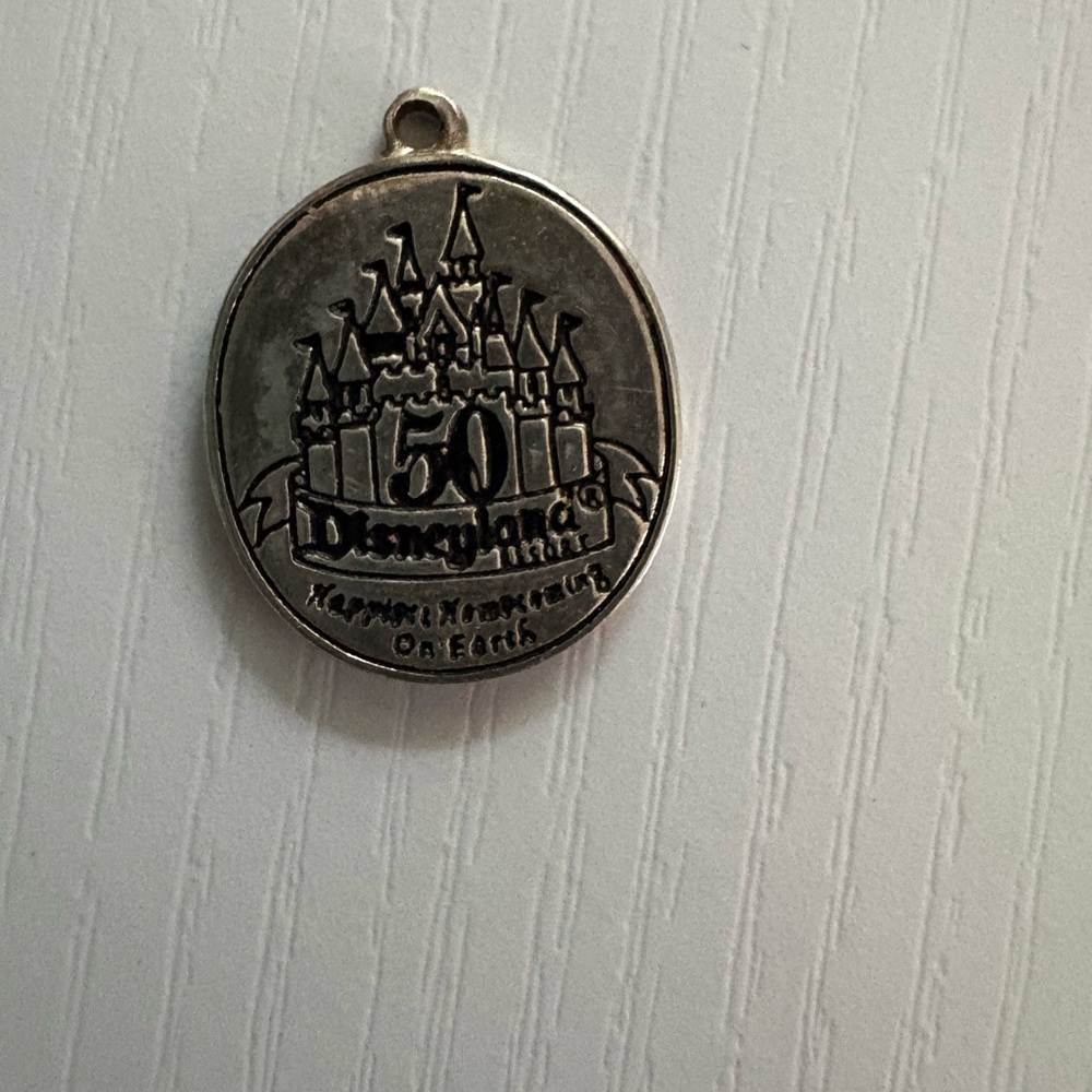 Disney silver pendant 50 anniversary.